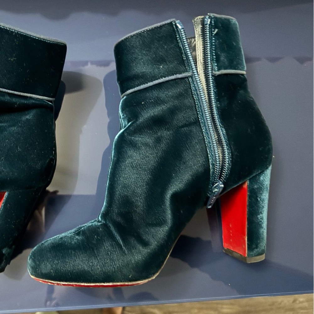 Loubotin booties in emerald suede/velvet